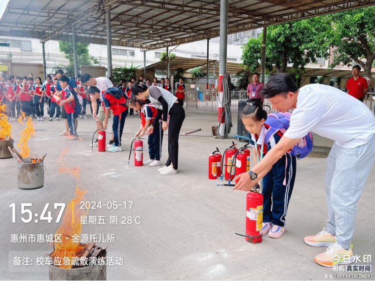 校車應(yīng)急演練 筑牢安全防線--惠州市惠城區(qū)金源學校2024年春季校車應(yīng)急逃生演練暨滅火器使用培訓活動