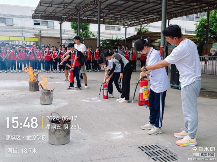 校車應(yīng)急演練 筑牢安全防線--惠州市惠城區(qū)金源學校2024年春季校車應(yīng)急逃生演練暨滅火器使用培訓活動